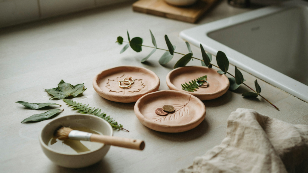 Air-dry clay leaf trinket dishes, real leaves as stamps to shape small catch-all dishes—great for jewelry, coins, or even table decor.